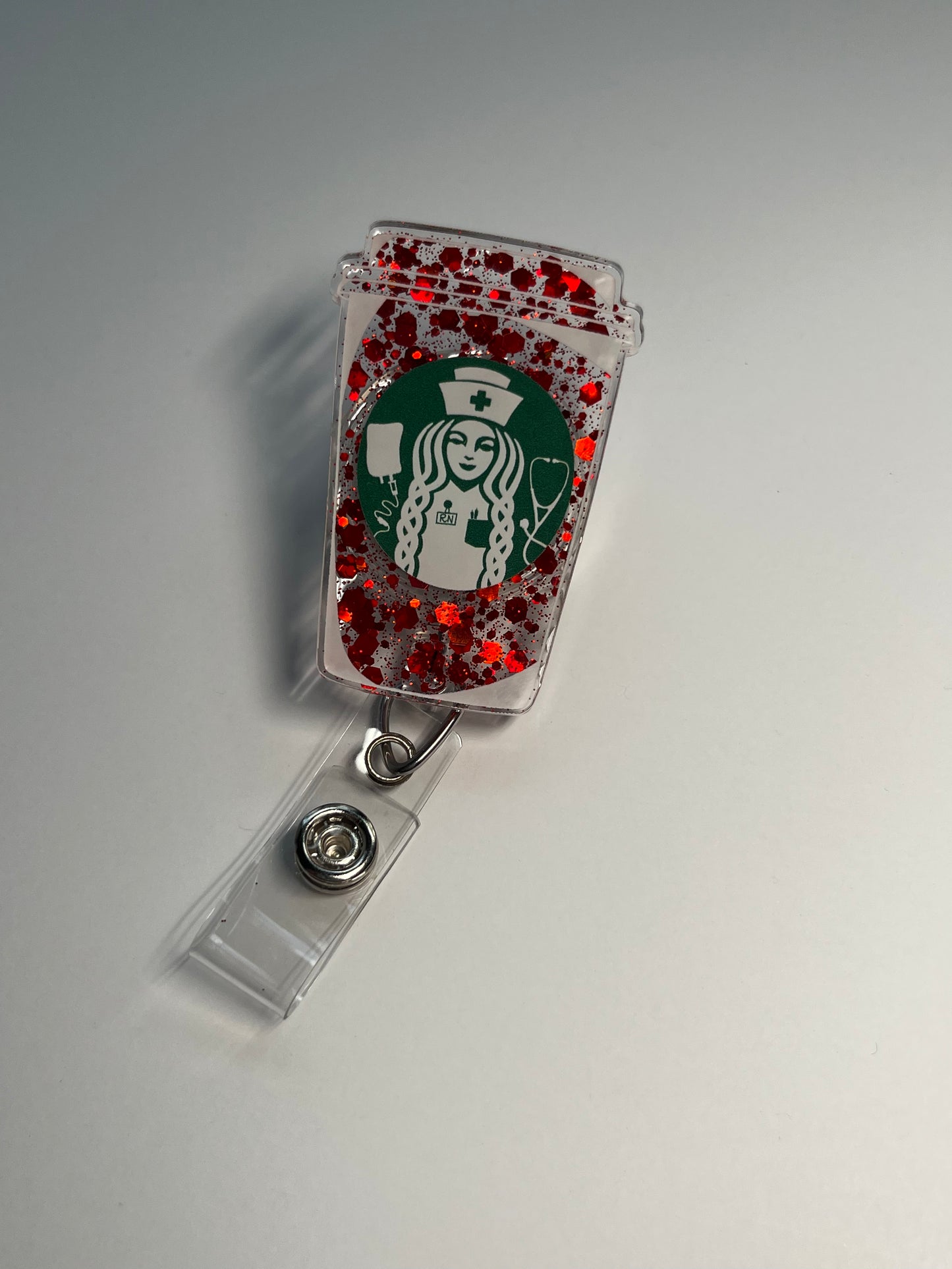 siReN Holiday Coffee Cup Badge Reel