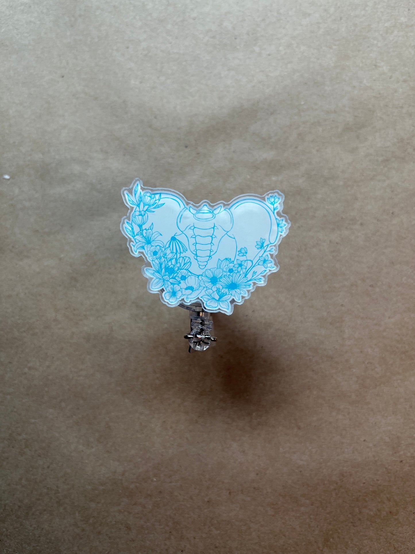 Floral Pelvis Badge Reel