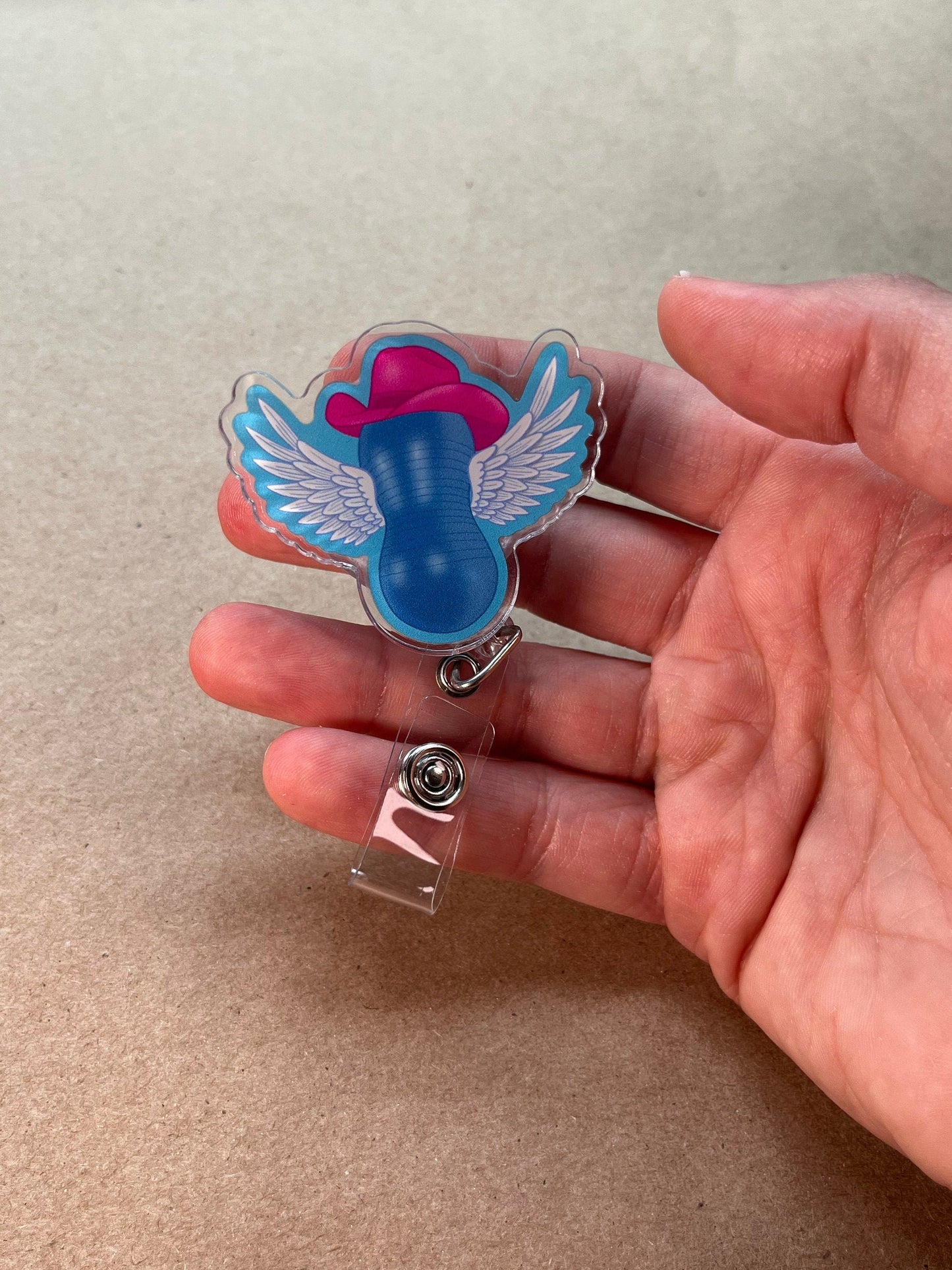 Flying Cowgirl Peanut Ball Badge Reel