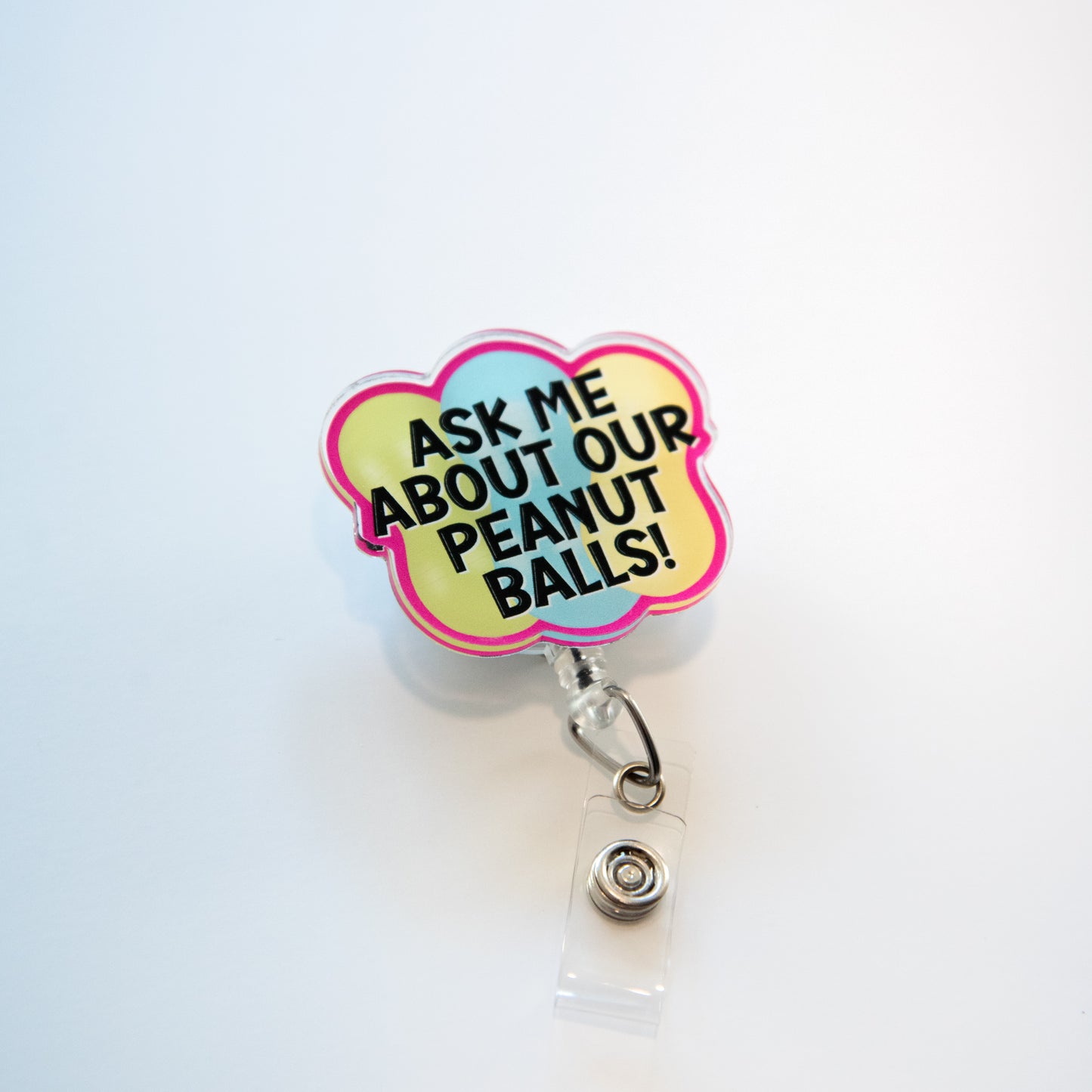 Ask Me About Our Peanut Balls Badge Reel